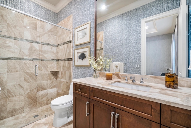 bathroom featuring crown molding, vanity, a shower stall, and toilet
