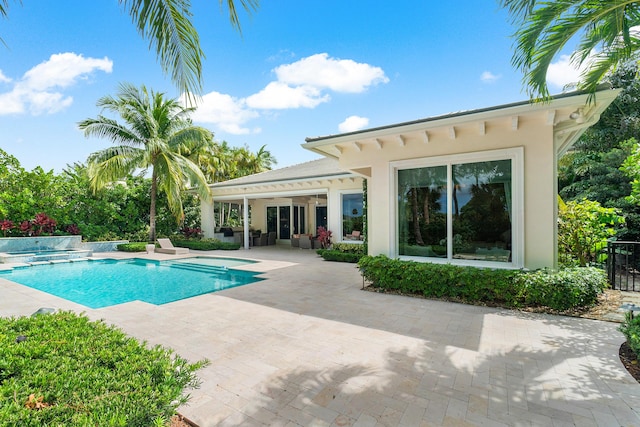 outdoor pool with a patio