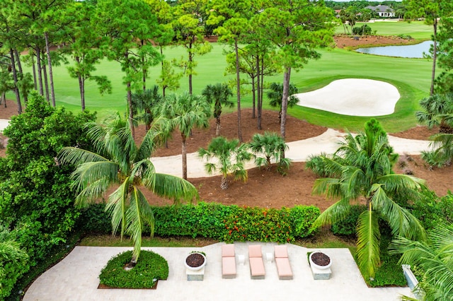 view of home's community featuring a water view and golf course view