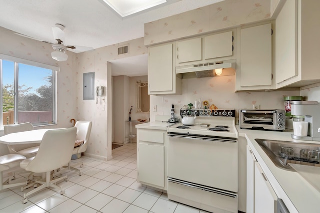 6585 Kensington Ln Unit 307, Delray Beach, FL 33446 - kitchen with white range with electric cooktop, under cabinet range hood, wallpapered walls, light countertops, and electric panel