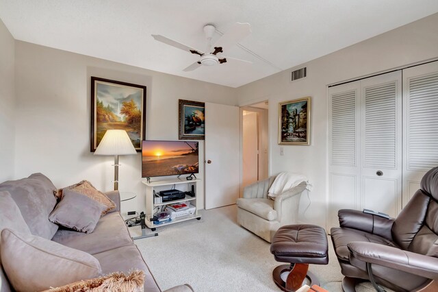 6585 Kensington Ln Unit 307, Delray Beach, FL 33446 - carpeted living room with a ceiling fan