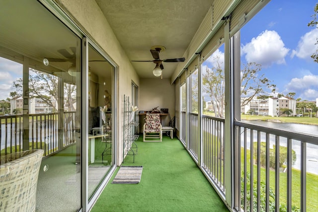 6585 Kensington Ln Unit 307, Delray Beach, FL 33446 - sunroom with a water view, ceiling fan, and a residential view