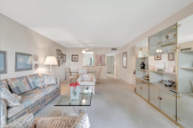 6585 Kensington Ln Unit 307, Delray Beach, FL 33446 - carpeted living room with a ceiling fan