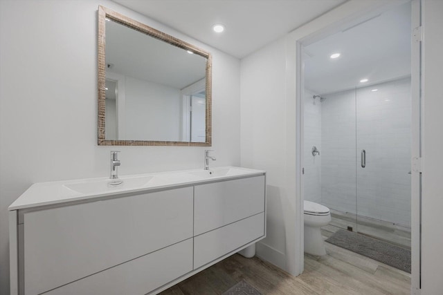 13334 Polo Club Rd Unit 234/235, Wellington, FL 33414 - full bath featuring a sink, wood finished floors, toilet, and a shower stall