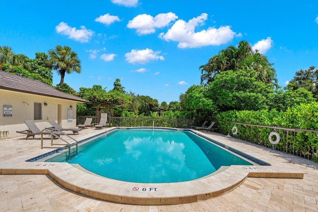 13334 Polo Club Rd Unit 234/235, Wellington, FL 33414 - pool with a patio area and fence