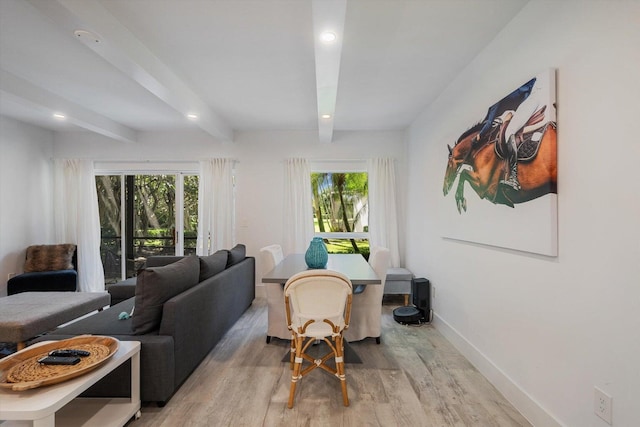 13334 Polo Club Rd Unit 234/235, Wellington, FL 33414 - living room featuring baseboards, beamed ceiling, light wood finished floors, and a wealth of natural light