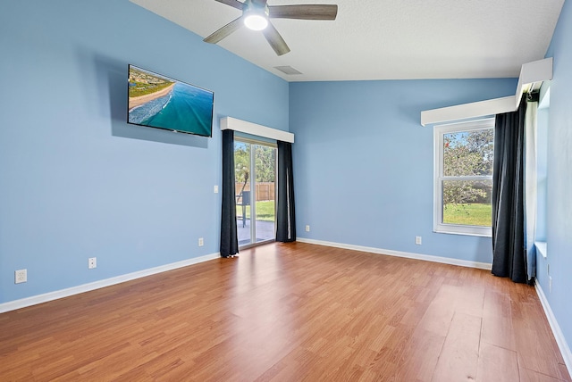500 N Cypress Dr, Tequesta, FL 33469 - spare room with wood finished floors, a ceiling fan, and baseboards