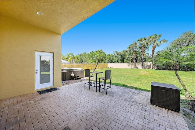 500 N Cypress Dr, Tequesta, FL 33469 - view of patio featuring a hot tub