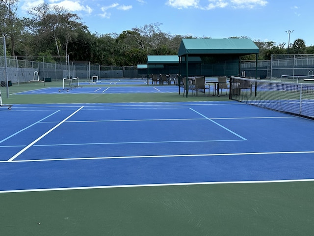 3206 Carambola Cir S, Coconut Creek, FL 33066 - view of sport court featuring fence