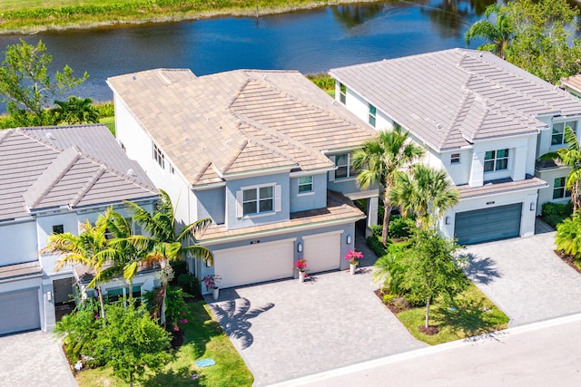 view of subject property with a nearby body of water