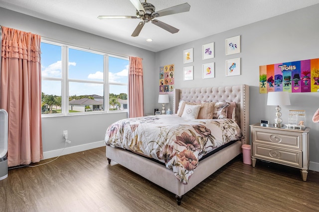 bedroom featuring dark wood-style floors, baseboards, ceiling fan, and recessed lighting