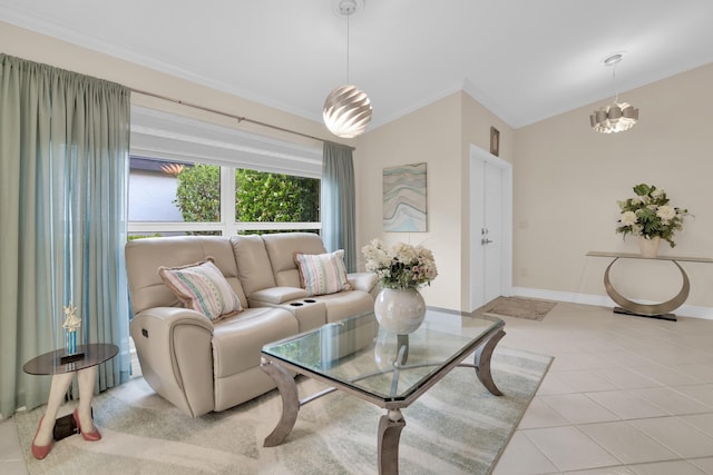 living room with ornamental molding, light tile patterned floors, baseboards, and a chandelier