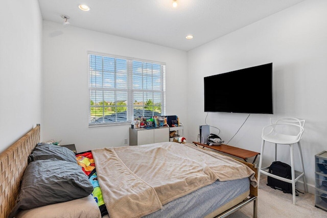 carpeted bedroom featuring recessed lighting