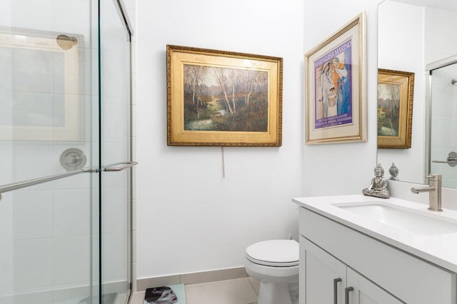full bath featuring vanity, tile patterned flooring, a stall shower, and toilet