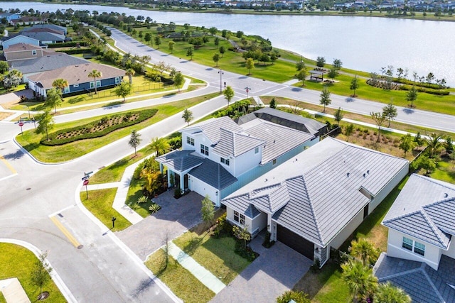 aerial view featuring a water view and a residential view