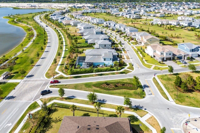 aerial view featuring a water view and a residential view