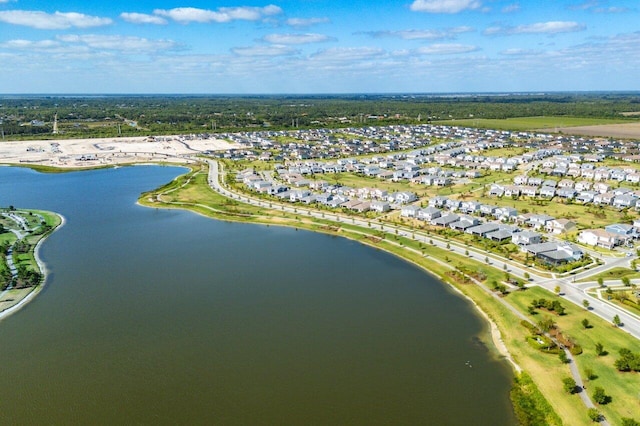 bird's eye view with a water view and a residential view