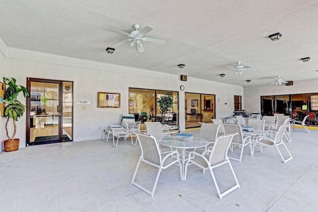 3710 Whitehall Dr Unit 304, West Palm Beach, FL 33401 - view of patio / terrace with ceiling fan and outdoor dining space