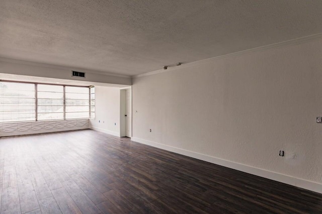 3710 Whitehall Dr Unit 304, West Palm Beach, FL 33401 - empty room featuring a textured ceiling, crown molding, dark wood-type flooring, and baseboards