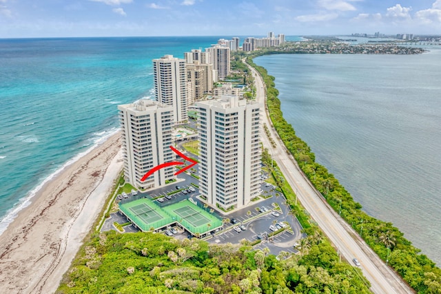 bird's eye view featuring a beach view, a water view, and a city view