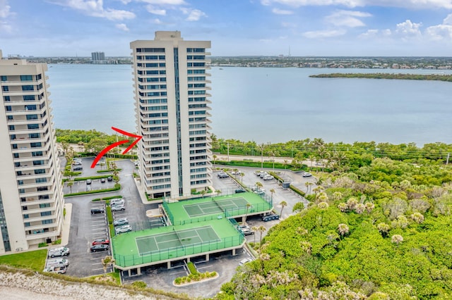 drone / aerial view with a water view