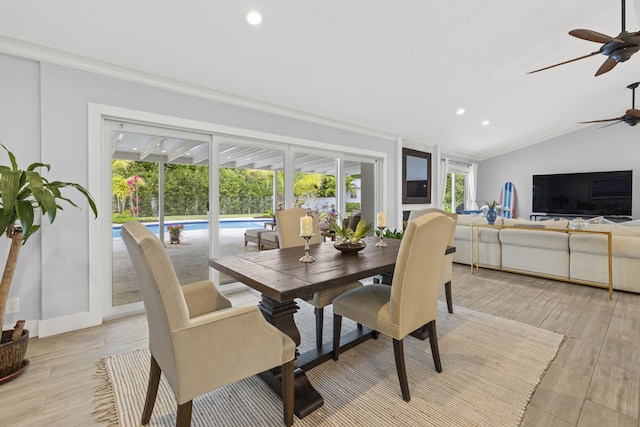 dining room featuring a ceiling fan, recessed lighting, crown molding, vaulted ceiling, and light wood-type flooring