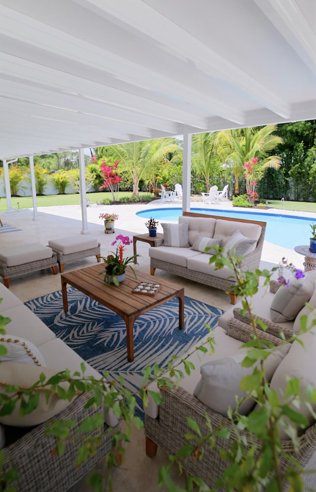 17767 Mellen Ln, Jupiter, FL 33478 - view of patio with an outdoor living space and an outdoor pool