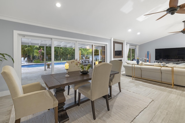 dining room with ceiling fan, plenty of natural light, recessed lighting, ornamental molding, and lofted ceiling