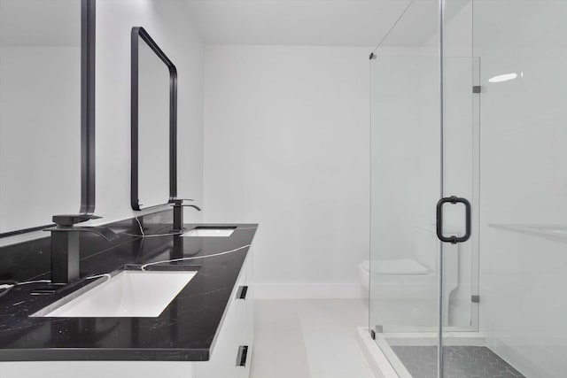 20685 NE 2nd Ave, Miami, FL 33179 - bathroom featuring a sink, a shower stall, and double vanity