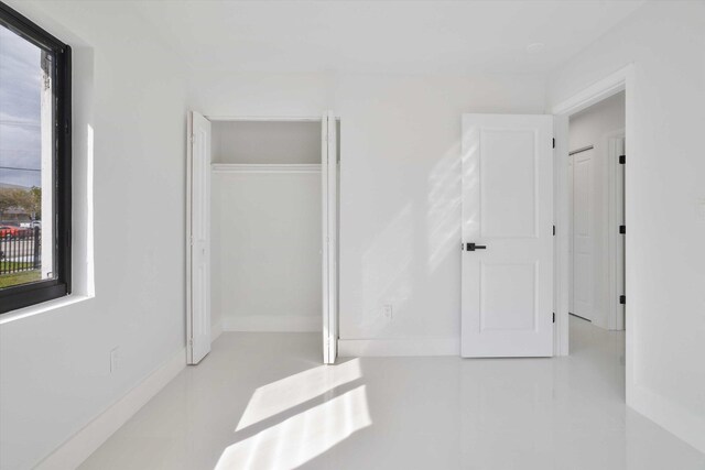 20685 NE 2nd Ave, Miami, FL 33179 - unfurnished bedroom featuring a closet