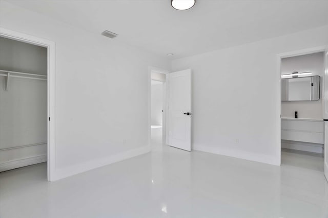 20685 NE 2nd Ave, Miami, FL 33179 - unfurnished bedroom with baseboards, a closet, and visible vents