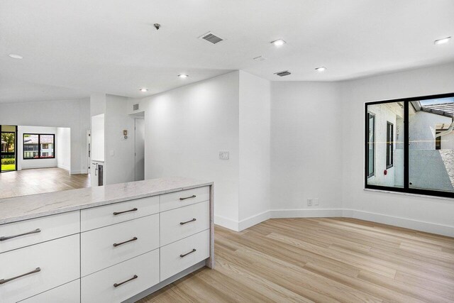 15687 Loch Maree Ln Unit 2404, Delray Beach, FL 33446 - spare room featuring light wood-style floors, baseboards, recessed lighting, and a pendent fire sprinkler