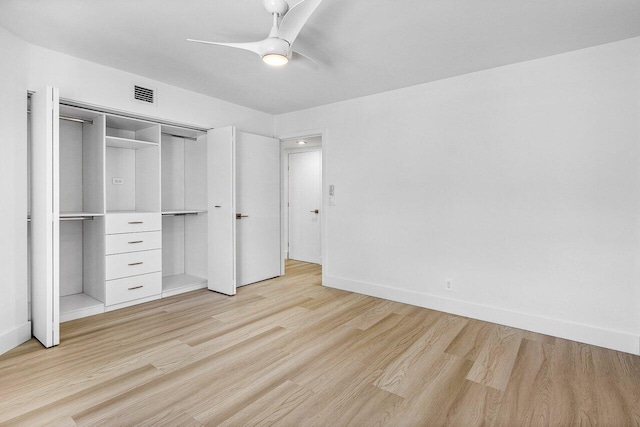 15687 Loch Maree Ln Unit 2404, Delray Beach, FL 33446 - unfurnished bedroom featuring light wood-style flooring, baseboards, a closet, and ceiling fan