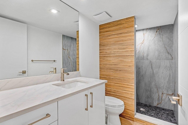 15687 Loch Maree Ln Unit 2404, Delray Beach, FL 33446 - bathroom featuring toilet, a marble finish shower, vanity, and recessed lighting