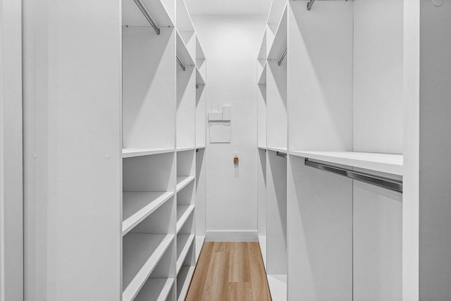 15687 Loch Maree Ln Unit 2404, Delray Beach, FL 33446 - walk in closet with light wood finished floors