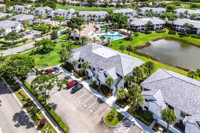 15687 Loch Maree Ln Unit 2404, Delray Beach, FL 33446 - aerial perspective of suburban area featuring a pool and a large body of water