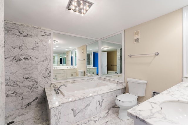 full bathroom featuring vanity, toilet, a bath, and visible vents