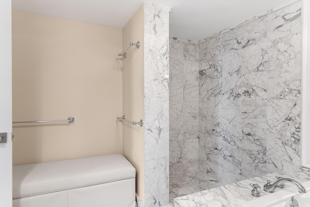 bathroom with a sink and a shower