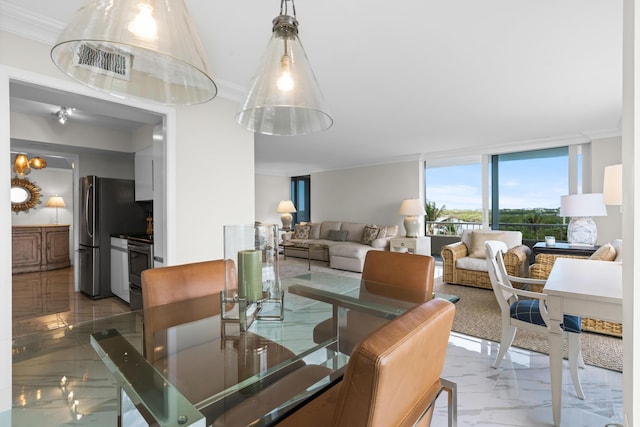 dining room featuring crown molding, visible vents, floor to ceiling windows, and marble finish floor