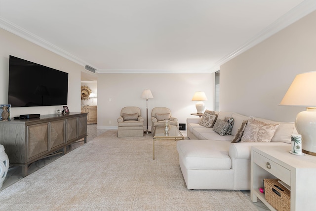 living area with crown molding, baseboards, visible vents, and light colored carpet