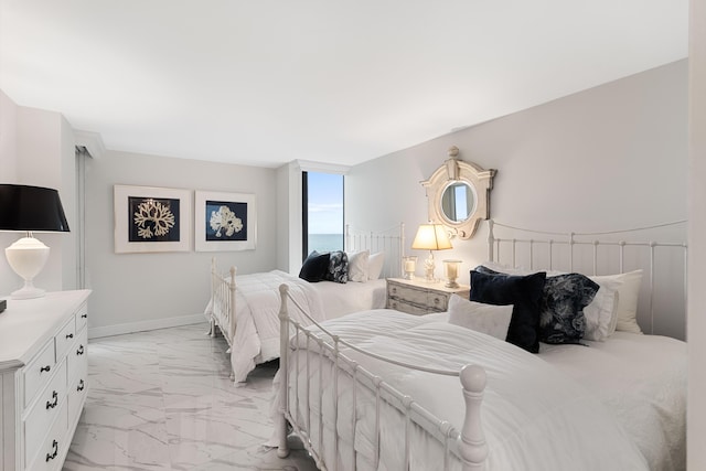 bedroom with marble finish floor