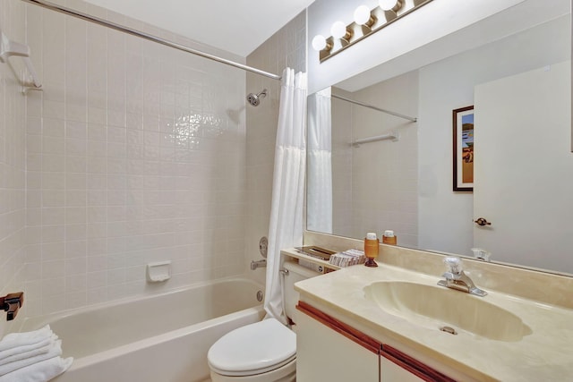 bathroom featuring vanity, toilet, and shower / tub combo