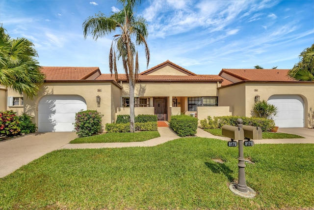 view of front of home with a garage, stucco siding, driveway, and a front lawn