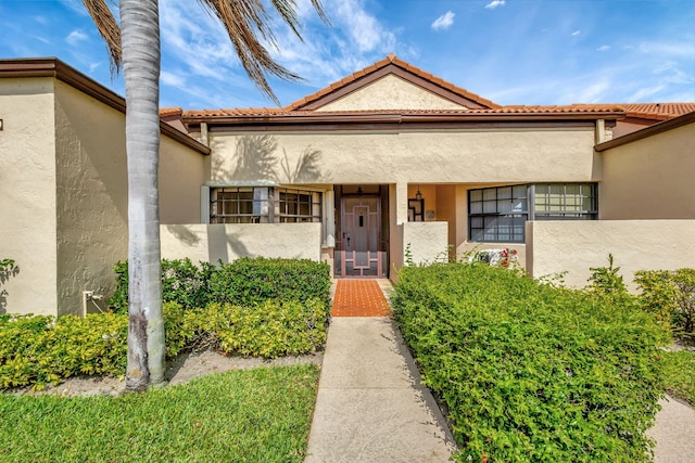 mediterranean / spanish-style home featuring stucco siding