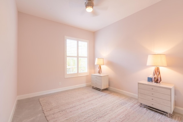 bedroom featuring baseboards and a ceiling fan