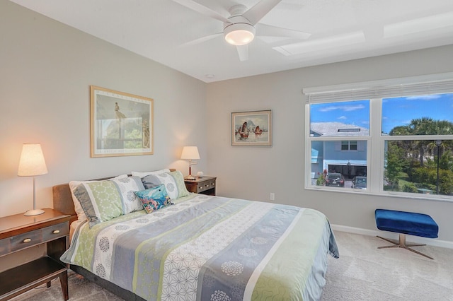 bedroom featuring baseboards, carpet flooring, and ceiling fan