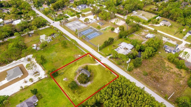 17924 W Sycamore Dr, Loxahatchee, FL 33470 - aerial view of property and surrounding area featuring property boundaries highlighted