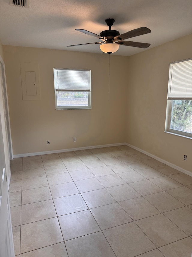 17924 W Sycamore Dr, Loxahatchee, FL 33470 - unfurnished room featuring ceiling fan, light tile patterned floors, and baseboards