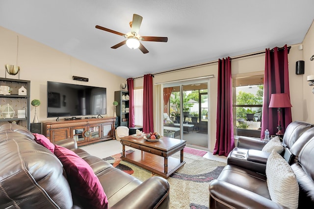 living area featuring a ceiling fan and vaulted ceiling
