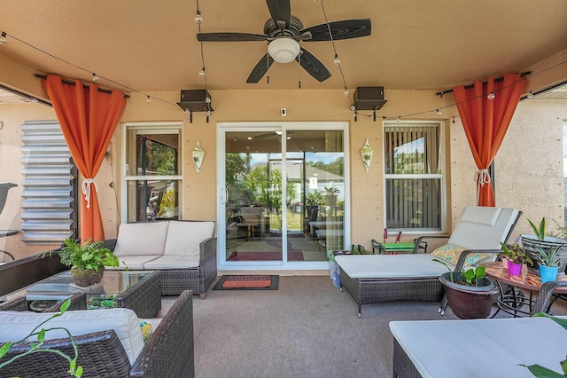 view of patio / terrace with outdoor lounge area and a ceiling fan